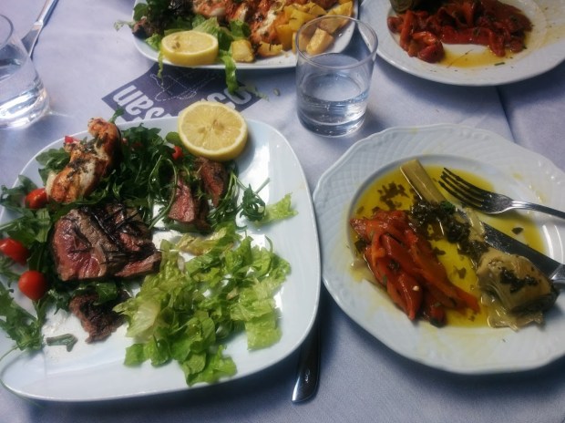 Lunch date!  Steak with greens, roasted red peppers, artichoke