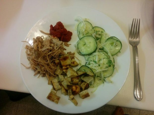 Pulled pork with homemade sauce, cucumber salad, and white sweet potatoes